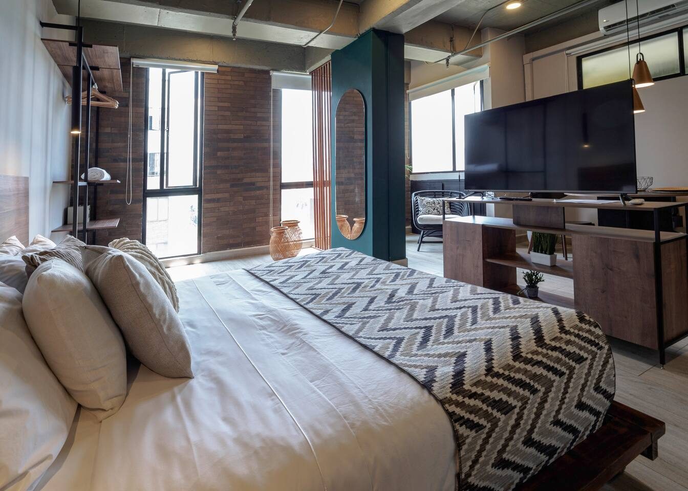 Loft with double bed, TV and large windows
