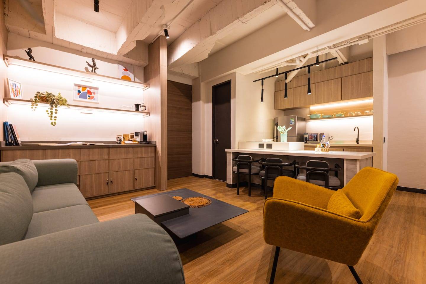 Open-plan living room with kitchen and island